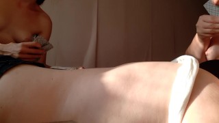 While my neighbor and I were playing cards, my girlfriend was licking my pussy under the table