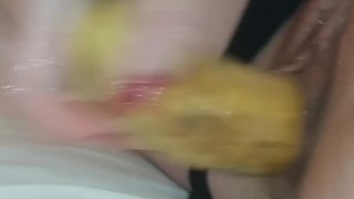 Horny blonde inserts her banana while her stepfather watches her