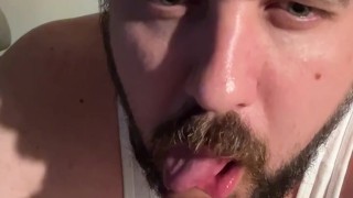 Sucking on a 9 inch dildo