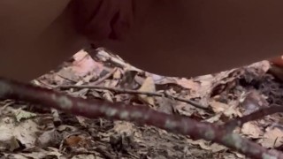 Pissing in the forest, watch her beautiful stream and hairy landing strip pussy