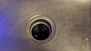 Messy piss into the kitchen sink