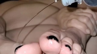 Oiling my sexy feet in slow motion!