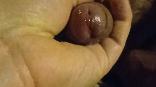 His dick is wet, a lot of sperm flows from it before he enjoys it