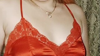 redheaded girl in a sexy red dress