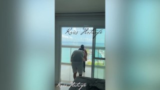 My husband's cuckold filming me showing off on the balcony to the males in the pool