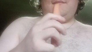 Sean enjoyin a hot dog