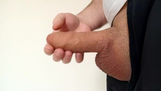 Close-up jerking in our apartment houses corridor on sunny day. Any of my neighbours could catch me