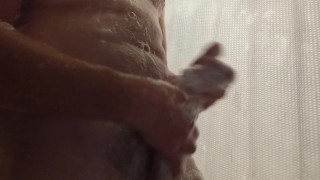 Playing with my thick cock in the shower