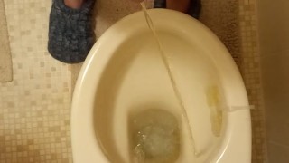 Long morning piss from long cut cock