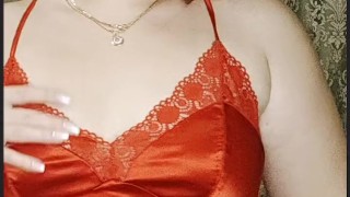 juicy redhead in a red dress