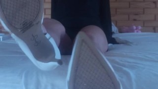 Sexy woman in heels, desiring a slave