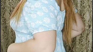 red-haired girl in a blue dress