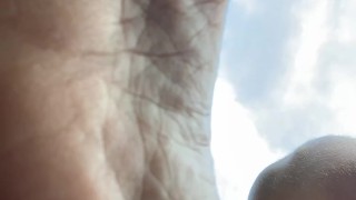 Redhead barefoot soles outside public