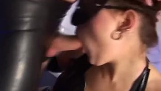 Sexy redheaded in latex gets cum on her face