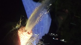 Pissing outside with bike light cold cock