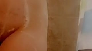 Hot milf soaps her curvy body