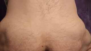 Hairy tattooed stud borrowing his roommate cum covered giant dildo.