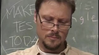 Teen with ponytails bends over on the desk to get spanked from her professor