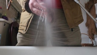 Pissing at home with a jacket