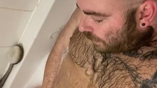 Stocky bear pisses all over himself