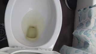 Taking a giant piss after a long workout.