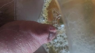 Pissing in the glass with pressure