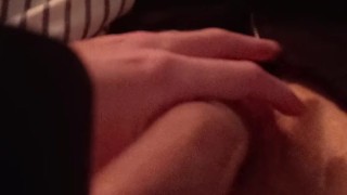 Playing with thick mushroom-headed cock in a tight condom