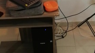 My girlfriend kneels down to suck my cock.