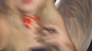 Angel of hell. Halloween costume. Cute girls smoke with me