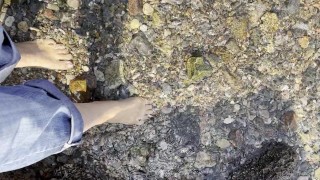 Playing with stones using toes