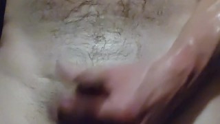 Stroking his cock in a pubic sauna!!!!