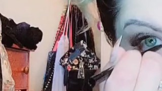 Sexy woman smoking at vanity