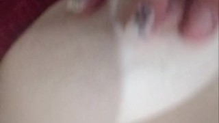 MILF sucks toy and plays with wet pussy