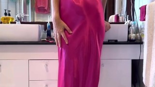 Sexy cougar dressed in satin ready for a night of fun