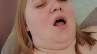 A fat girl shows her face, moans from the vibrations and thanks Ben