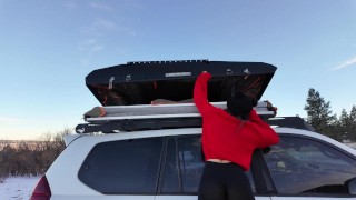 Mountain girl shows off rooftop tent set up and light up butt plug