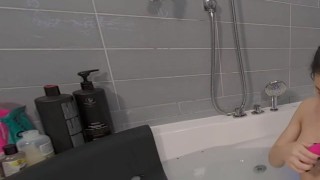 Solo brunette Cinderella plays with a dildo in the bathroom in 4K.