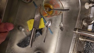 Quick piss on the dirty dishes