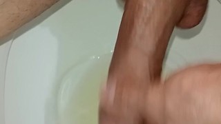 Man fetish PEEING with vertical camera PEEING on a hard fat cock