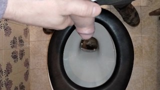 A COUPLE PEES IN A PUBLIC TOILET WITH GOLDEN SHOWER FOR HIM