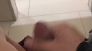 playing with my dick in a public bathroom