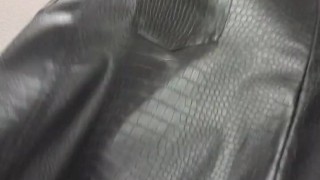 Femboy tries on women's blouse and skirt in store fitting room