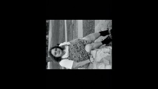 Nurse vicki models in her black and whot hogwarts outfit and spiked boots