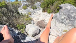 Touching her young and saggy tits and pussy in front of people outdoor