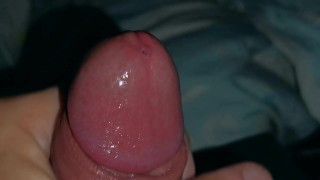 Very close-up of an over-excited penis and streams of pre-cum!