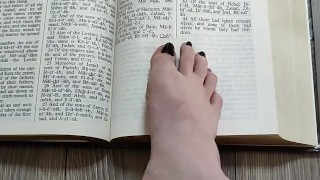 Using my long finger toes to flip through the pages of a Bible with my clean barefeet