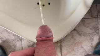Peeing with uncircumcised penis in public toilet view from my eyes