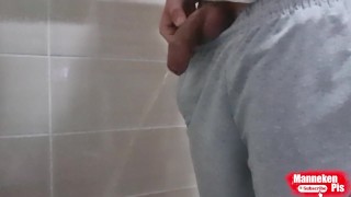 Guy long pissing with uncircumcised cock and big balls