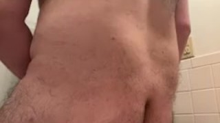 chubby bear riding a dildo in the bathroom