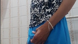 Man with a big cock masturbates in a bathroom